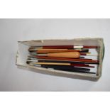 BOX CONTAINING ARTISTS BRUSHES