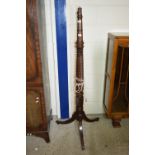 HEAVILY CARVED STAINED WOOD LAMP STANDARD RAISED ON TRIPOD LEGS, HEIGHT APPROX 160CM
