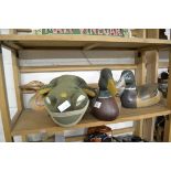 THREE POTTERY DUCKS AND A MODEL OF A FROG