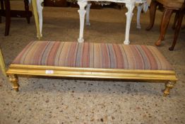 UPHOLSTERED GILT PAINTED FOOT STOOL, APPROX 90CM X 33CM