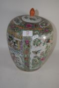 ORIENTAL JAR AND COVER DECORATED IN A FAMILLE ROSE PALETTE