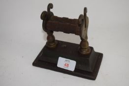 LATE 19TH CENTURY KNIFE SHARPENER ON PEDESTAL METAL BASE