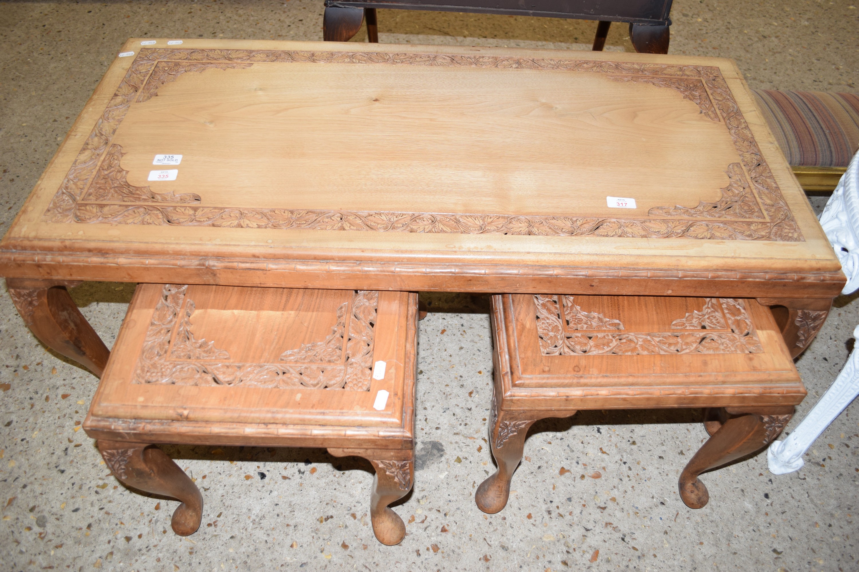 SET OF THREE LOW COFFEE TABLES, ALL WITH SIMILAR CARVED FRETWORK DECORATION, LARGEST APPROX 109 X