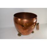 LARGE COPPER JARDINIERE WITH BRASS FEET