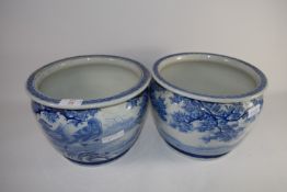 PAIR OF JAPANESE PORCELAIN BLUE AND WHITE JARDINIERES WITH A DESIGN OF BIRDS