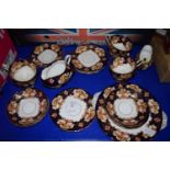 TEA SET IN AN IMARI DESIGN BY ROYAL ALBERT COMPRISING CUPS, SAUCERS, MILK JUG, DERBY STYLE MILK JUG,