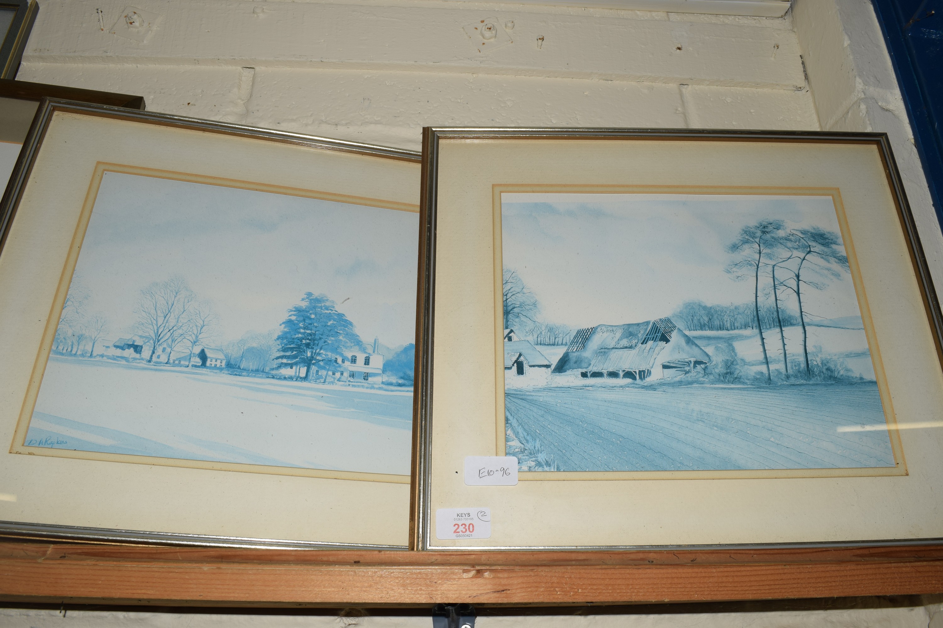 PAIR OF PRINTS OF LANDSCAPES IN SILVER WOODEN FRAMES