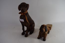 TWO CARVED WOODEN DOGS