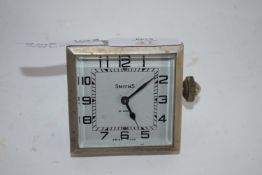 SMITHS 8-DAY CLOCK WITH ART DECO TYPE DIAL AND METAL FIXING TO REAR STAMPED 7209