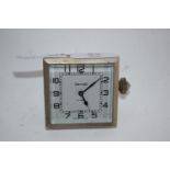 SMITHS 8-DAY CLOCK WITH ART DECO TYPE DIAL AND METAL FIXING TO REAR STAMPED 7209