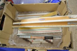 BOX CONTAINING SLIDE RULES