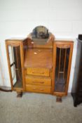 MID-20TH CENTURY OAK WALL UNIT COMPRISING DROP FRONT BUREAU BETWEEN TWO ASTRAGAL GLAZED DISPLAY