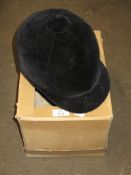 BOX CONTAINING A BLACK RIDING HAT (INTERNAL MEASUREMENTS 15 X 19CM APPROX)