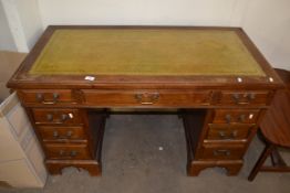 REPRODUCTION MID-20TH CENTURY TWIN PEDESTAL DESK WITH LEATHER INSERT TOP AND BRASS HANDLES, 121CM