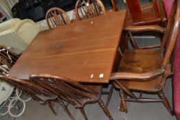 REPRODUCTION DINING TABLE WITH RAISED STRETCHER SUPPORT TOGETHER WITH A SET OF SIX DINING CHAIRS (