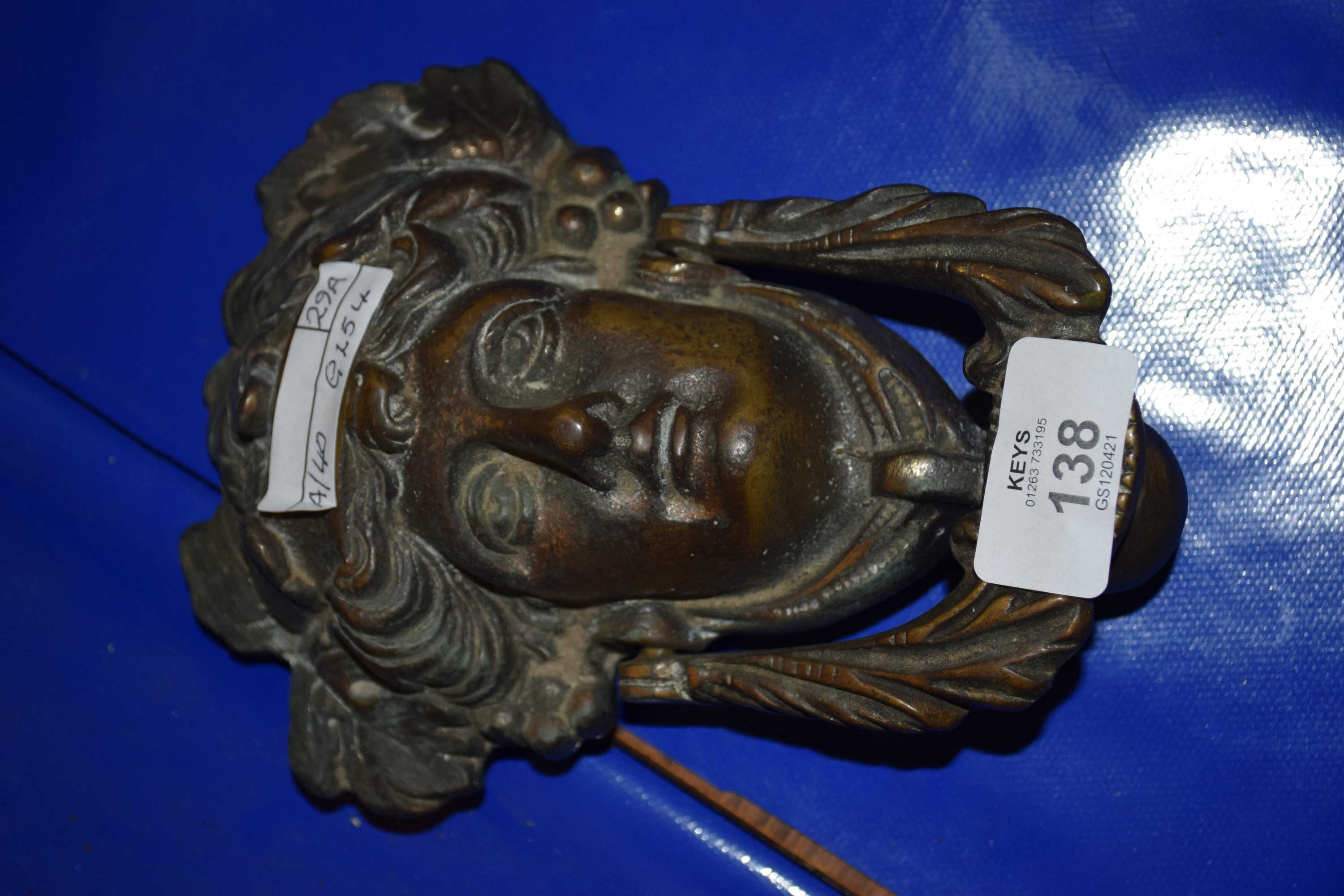 HEAVY METAL DOOR KNOCKER MODELLED AS A CLASSICAL LADY