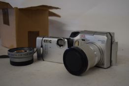SMALL BOX CONTAINING TWO CAMERAS TO INCLUDE AN OLYMPUS CAMEDIA DIGITAL CAMERA C-725 AND AN OLYMPUS