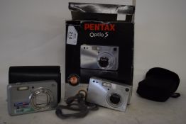 PENTAX OPTI-5 3.2 MGPXL DIGITAL CAMERA IN BOX TOGETHER WITH A FUJI FILM FINEPIX J210 10 MGPX