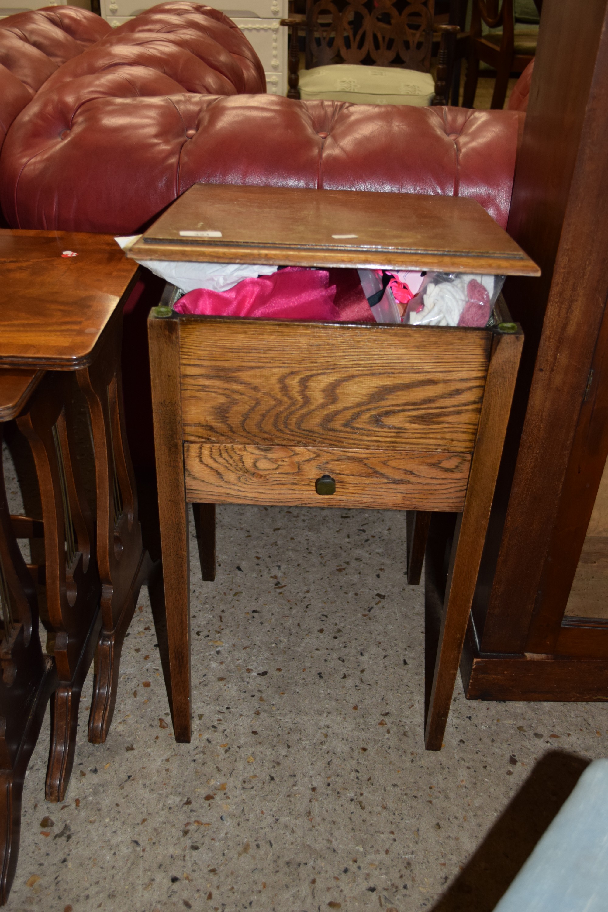 SMALL OAK SEWING BOX ON LEGS COMPLETE WITH CONTENTS INCLUDING LARGE QUANTITY OF VARIOUS SEWING