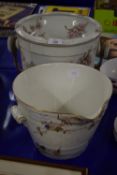 TWO CERAMIC PAILS WITH WICKER HANDLES