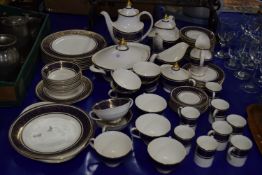 EXTENSIVE QUANTITY OF ROYAL DOULTON DINNER WARES IN IMPERIAL BLUE PATTERN, THE WARES WITH BLUE