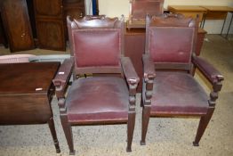 PAIR OF IMPRESSIVE LEATHER UPHOLSTERED ELBOW CHAIRS WITH CARVED DETAIL, EACH WIDTH APPROX 63CM