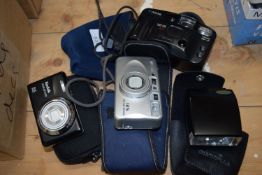 THREE CASED CAMERAS TO INCLUDE A CANON SURESHOT A5-7, A KODAK EASYSHARE 14MGPXL AND A MINOLTA 125