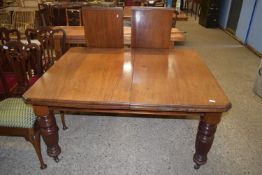 VICTORIAN MAHOGANY WIND OUT EXTENDING DINING TABLE RAISED ON HEAVILY CARVED LEGS, 143 X 118CM