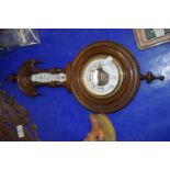 BAROMETER IN CIRCULAR MAHOGANY CASE WITH THERMOMETER ABOVE