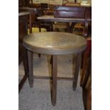 BRASS BENARES TYPE FOLDING TABLE WITH MOULDED DECORATION DEPICTING STYLISED MYTHICAL BIRDS, APPROX