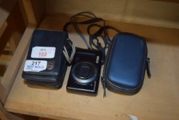 THREE CAMERAS TO INCLUDE A CANON IXUS 50 5MGPXL CAMERA TOGETHER WITH A CANON IXUS L-1 CAMERA AND A