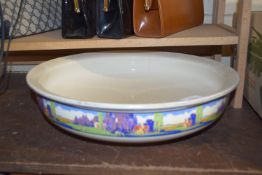 LARGE POTTER BOWL TRANSFER DECORATED WITH A LANDSCAPE SCENE TO EXTERIOR BORDER