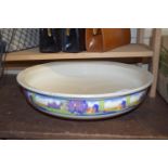 LARGE POTTER BOWL TRANSFER DECORATED WITH A LANDSCAPE SCENE TO EXTERIOR BORDER