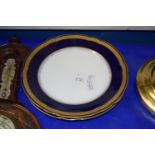 PAIR OF CONTINENTAL PORCELAIN PLATES WITH GILT RIMS