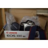 BOXED CANON E05300 KIT CAMERA IN ORIGINAL BOX PLUS A 282 19MM LENS