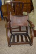 LEATHER BACKED LOW OAK CHAIR WITH HERALDIC DECORATION, WIDTH APPROX 55CM MAX