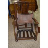 LEATHER BACKED LOW OAK CHAIR WITH HERALDIC DECORATION, WIDTH APPROX 55CM MAX