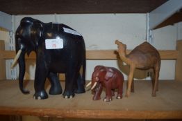 WOODEN CARVED ELEPHANT TOGETHER WITH A SMALLER ELEPHANT AND A CAMEL