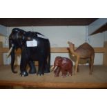 WOODEN CARVED ELEPHANT TOGETHER WITH A SMALLER ELEPHANT AND A CAMEL