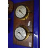 PAIR OF MATHER & PLATT PRESSURE GAUGES MOUNTED ON A WOODEN MOUNT