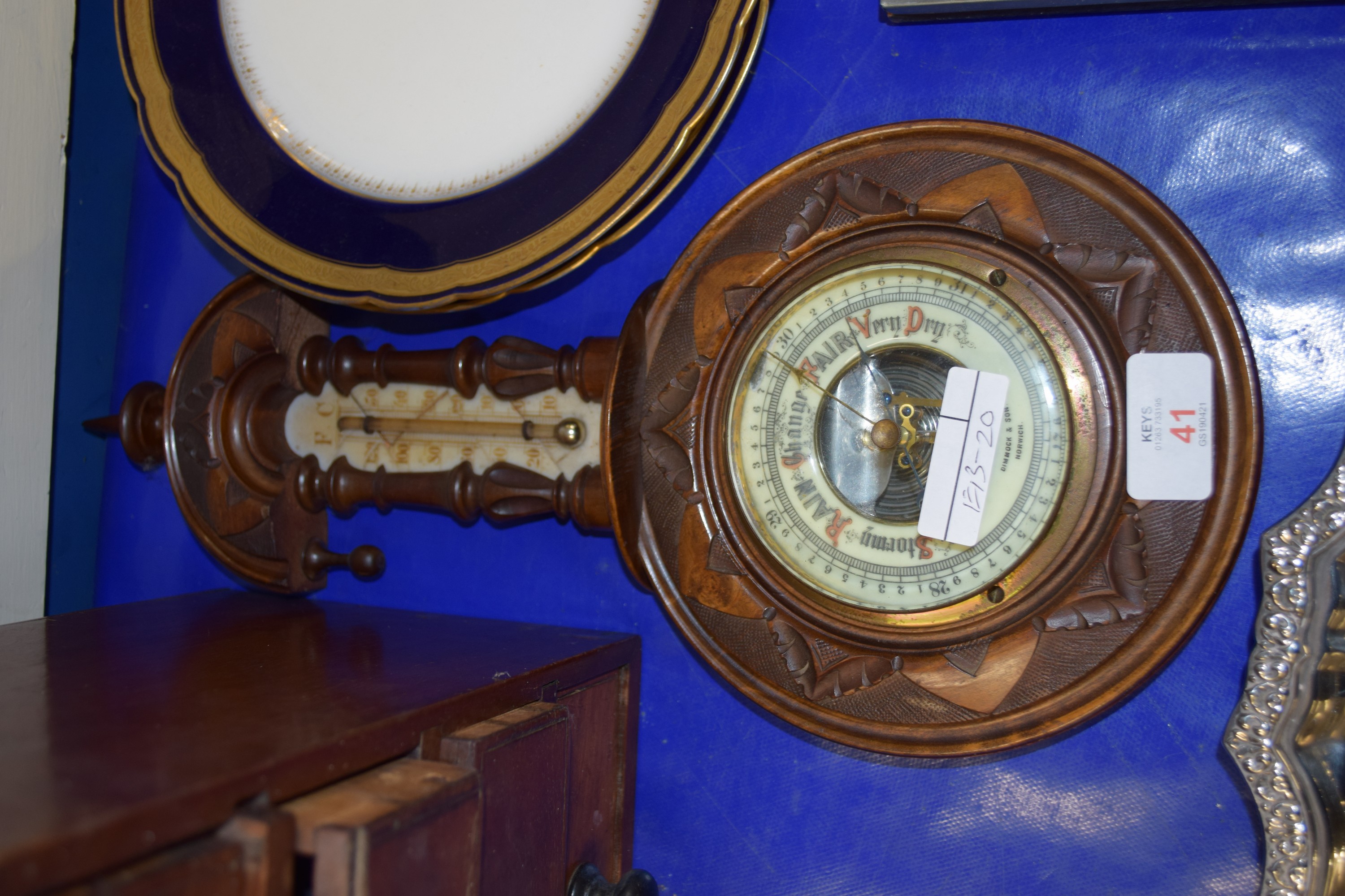 BAROMETER IN CIRCULAR WOODEN FRAME WITH THERMOMETER ABOVE