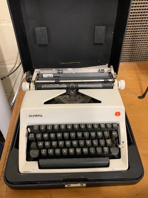 BOX CONTAINING A TYPEWRITER