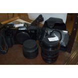 MIXED LOT OF CAMERAS TO INCLUDE A CASED CANON POWERSHOT G5 5MGPXL CAMERA AND A CANON E05650 AND