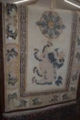 BROWN AND CREAM GROUND RUG WITH CENTRAL DRAGON DESIGN, 184 X 92CM