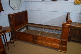 Ornately carved 19th century mahogany bed, approx 208 x 115cm