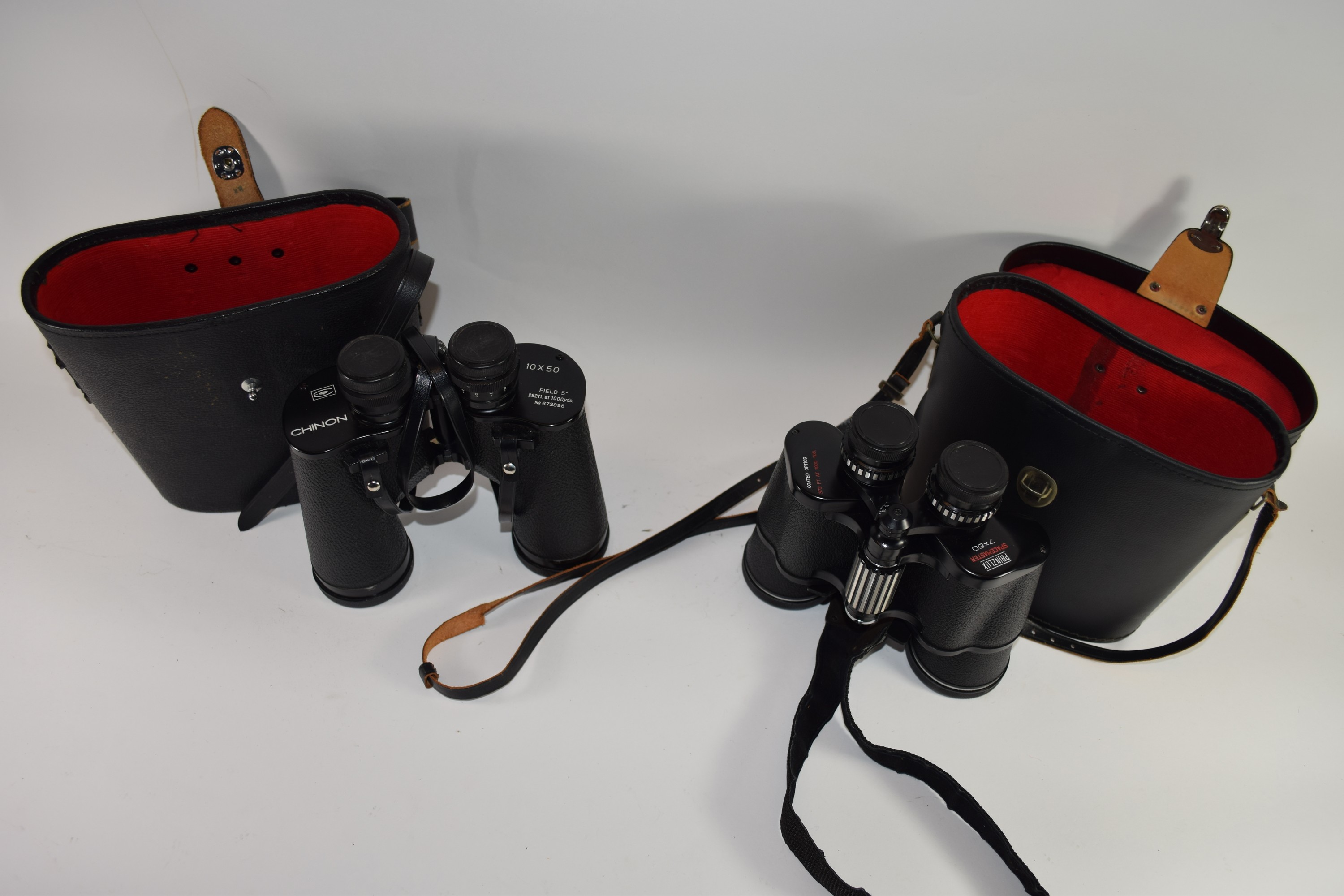 Two binoculars in cases, one manufactured by Chinon 10x50, the other by Prinzlux Spacemaster 7x50 ( - Image 2 of 2