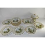 19th century English porcelain part dinner set, the centres decorated with prints of travellers