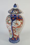 Japanese vase and cover, the blue ground with panels of flowers 31cm (Two chips to cover)