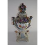 Large Continental porcelain vase with floral encrusted decoration, the reticulated cover with a