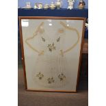 Framed 19th century maid's apron, the silk embroidered with flowers, in wooden frame